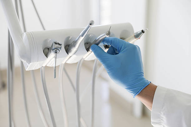 Professional Tooth Extraction technician working in Paw Paw, MI
